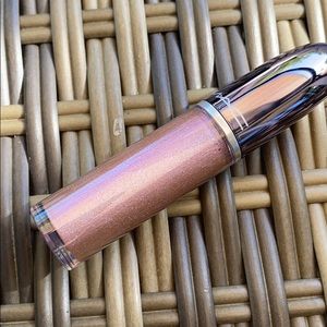 MAC grand illusion gloss “just hustlin”